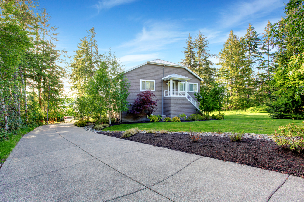 Crafting Lasting Impressions: How To Select The Best Concrete Driveway Contractor